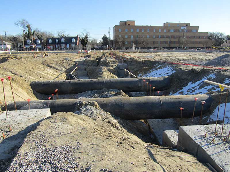 Storm sewer lines in courtyard.