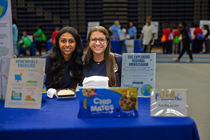 Two women at an informational booth at last year's STEM Community Day