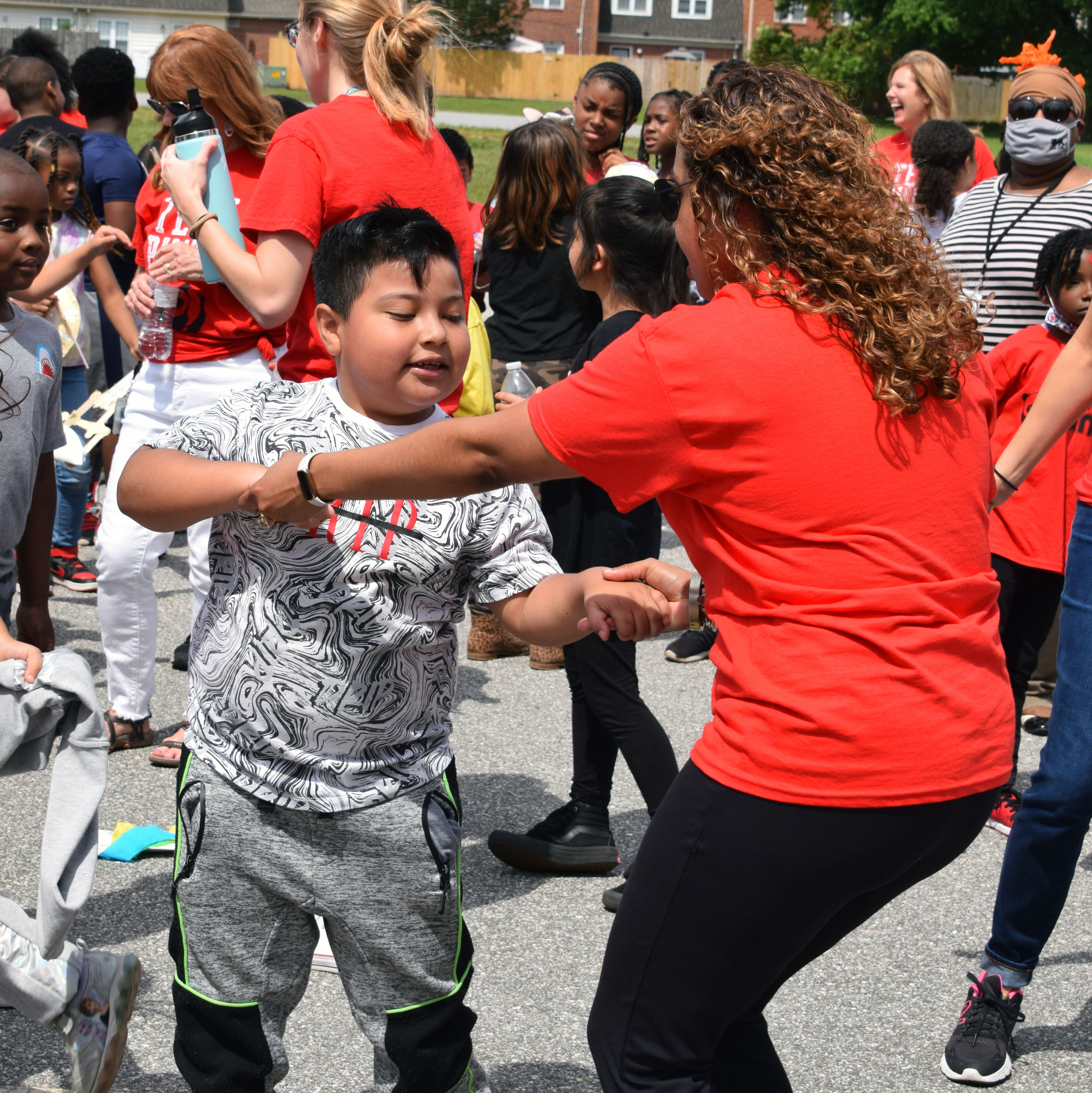 Teachers and students danced together to top off a happy anniversary celebration.