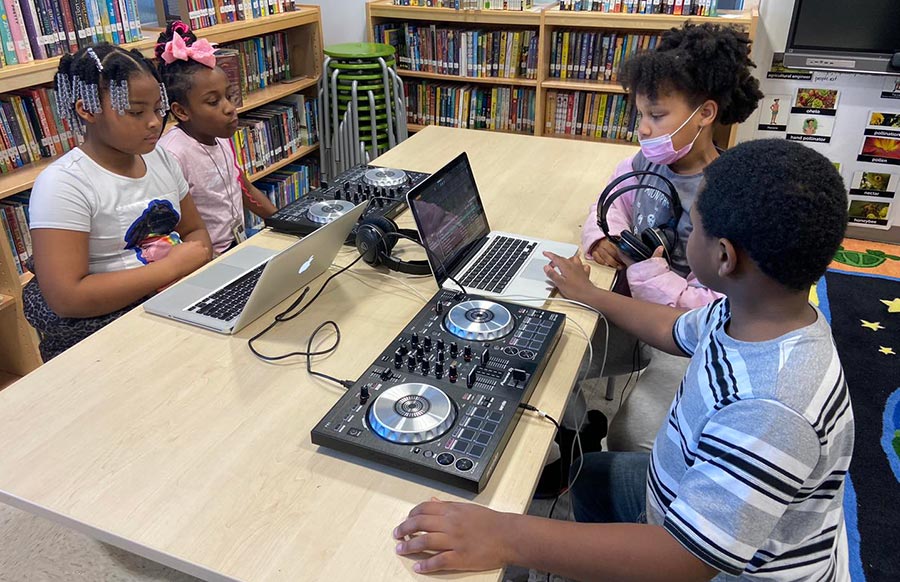 Discovery STEM Academy students experience a lesson in music making.