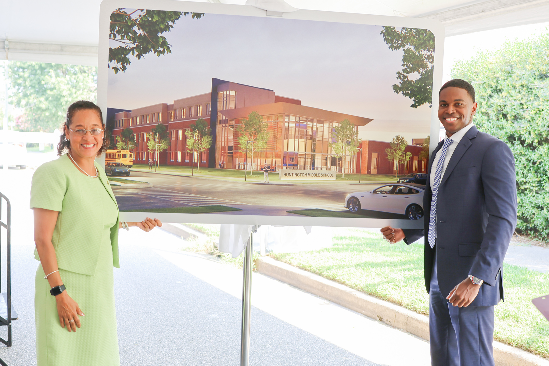 School Board Chair Lisa Surles-Law and Mayor Phillip Jones unveiled a rendering of the planned Huntington Middle School.