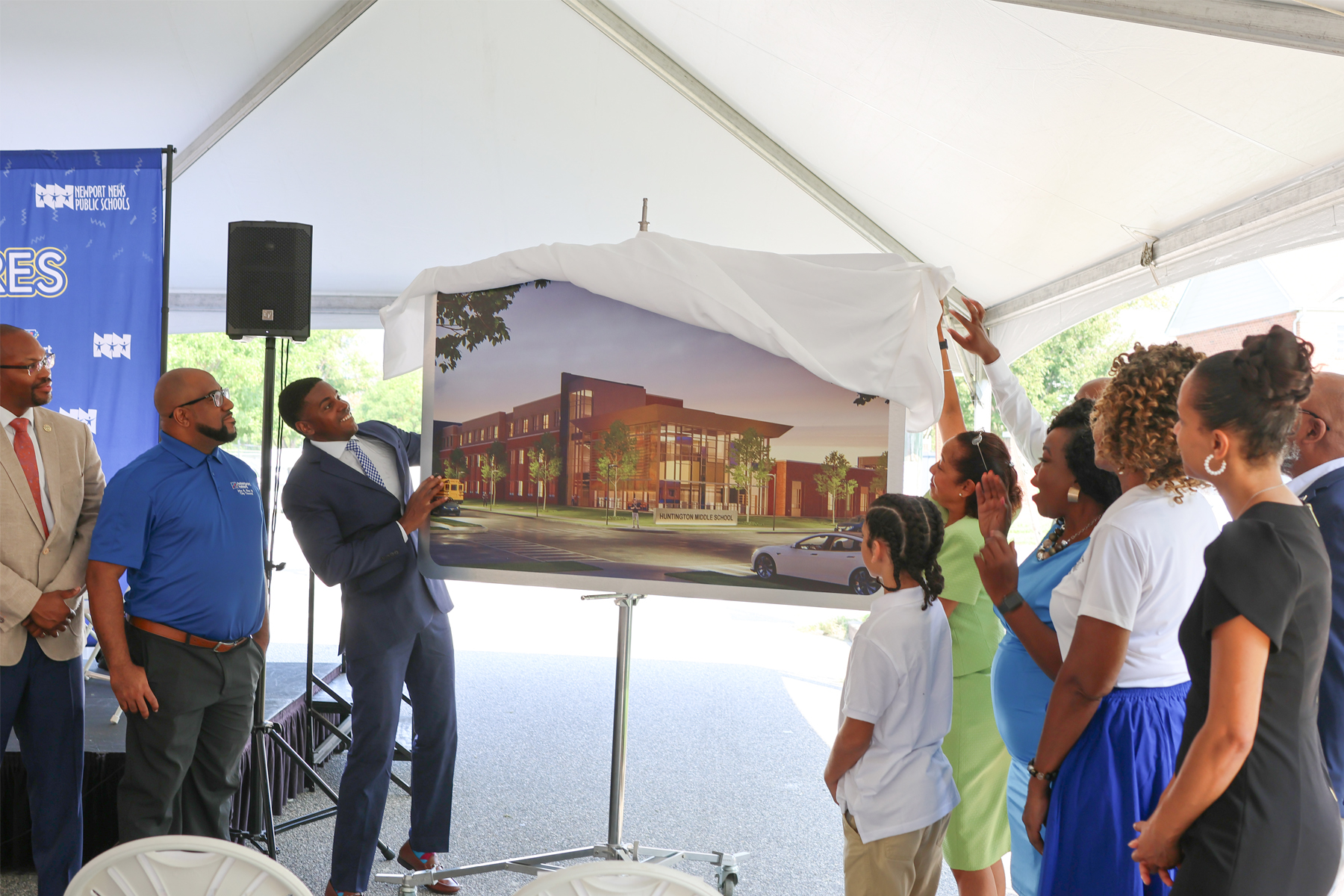 The School Board, City Council and other local officials unveiled a rendering of the planned Huntington Middle School.