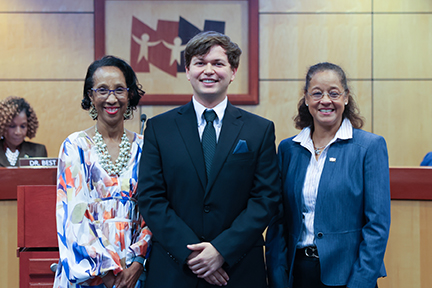 Superintendent Dr. Michele Mitchell (left), Razvan Verde (center) and School Board Chairman Lisa Surles-Law