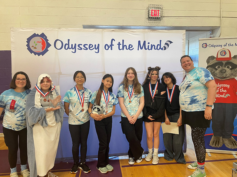 B.T. W. team (left to right) Coach Elana McCellan, Abigail Hughes, Claire Park, Catherine Park, Mia Migliore, Berkley Hanlon, Soreya Tierney, Coach Laura Nelson-Rogers
